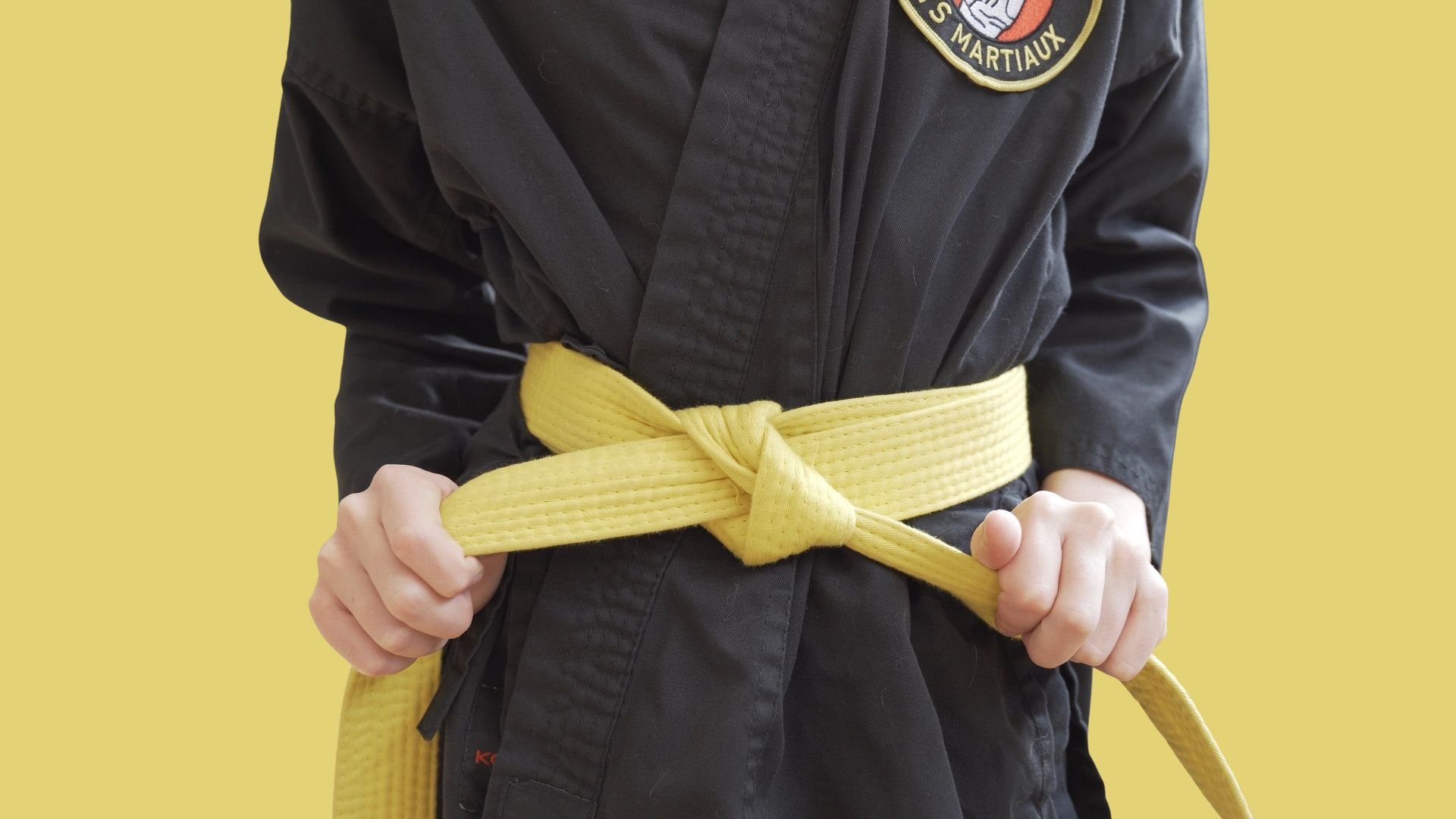 Passage ceinture barre jaune et jaune