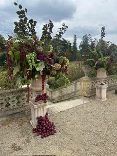 Wedding urns plums and burgundy flowers Hampshire