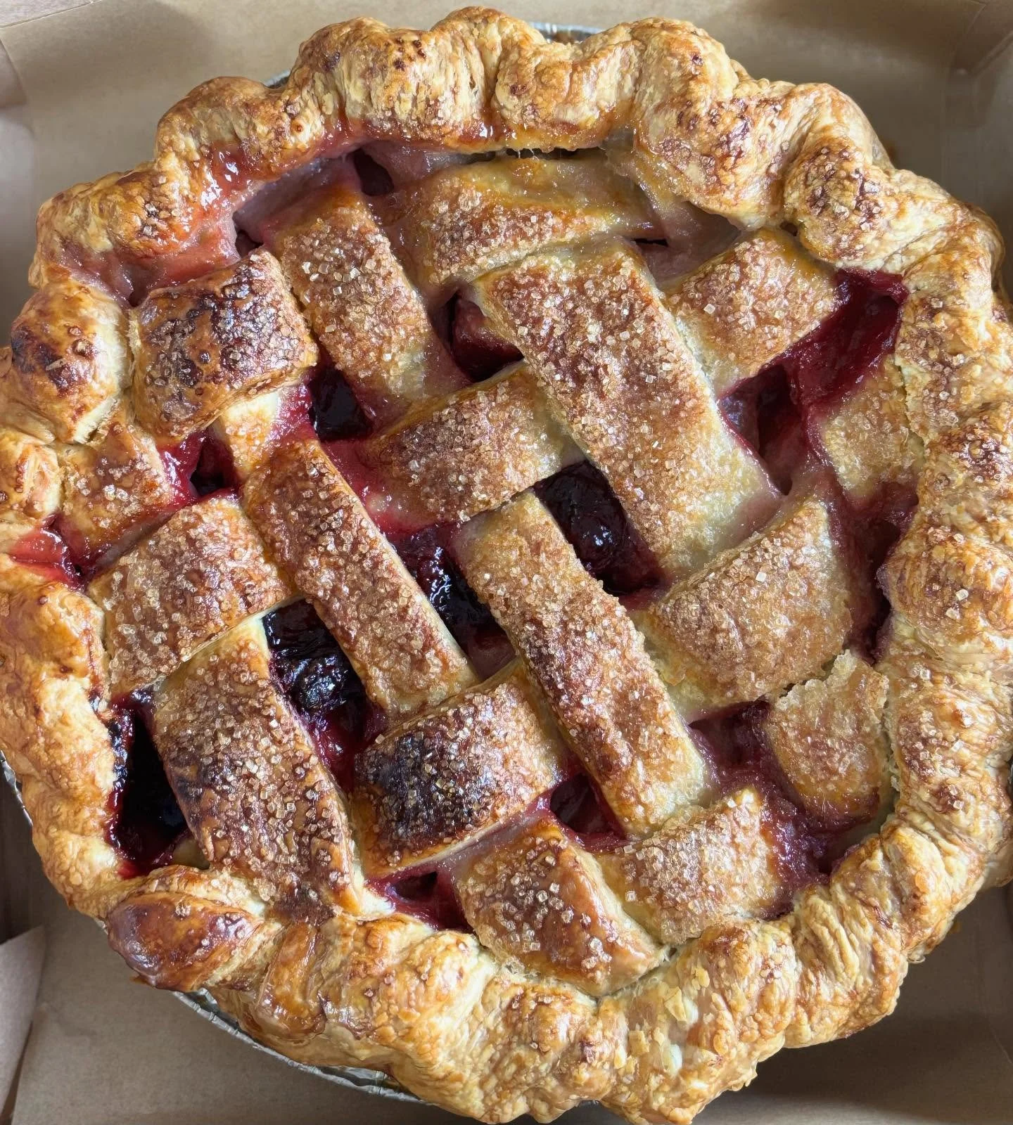 Holiday Orders are live and open for one more week!
This pie will be a stunner on your Holiday table. Our winter jewell pie is a mix of all Oregon grown strawberries, raspberries and cranberries tucked in with an all butter, hand woven lattice crust.