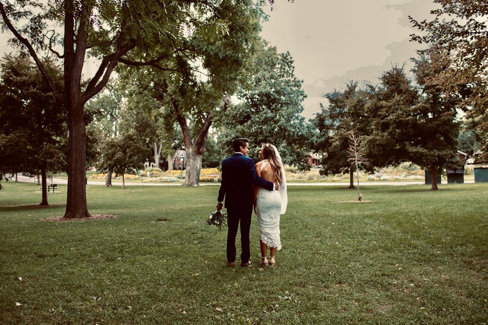 Gina Fidler and her husband walking through the park on their wedding day | Wash Park Health | Simple, Convenient, Personalized Healthcare in Wash Park, Denver