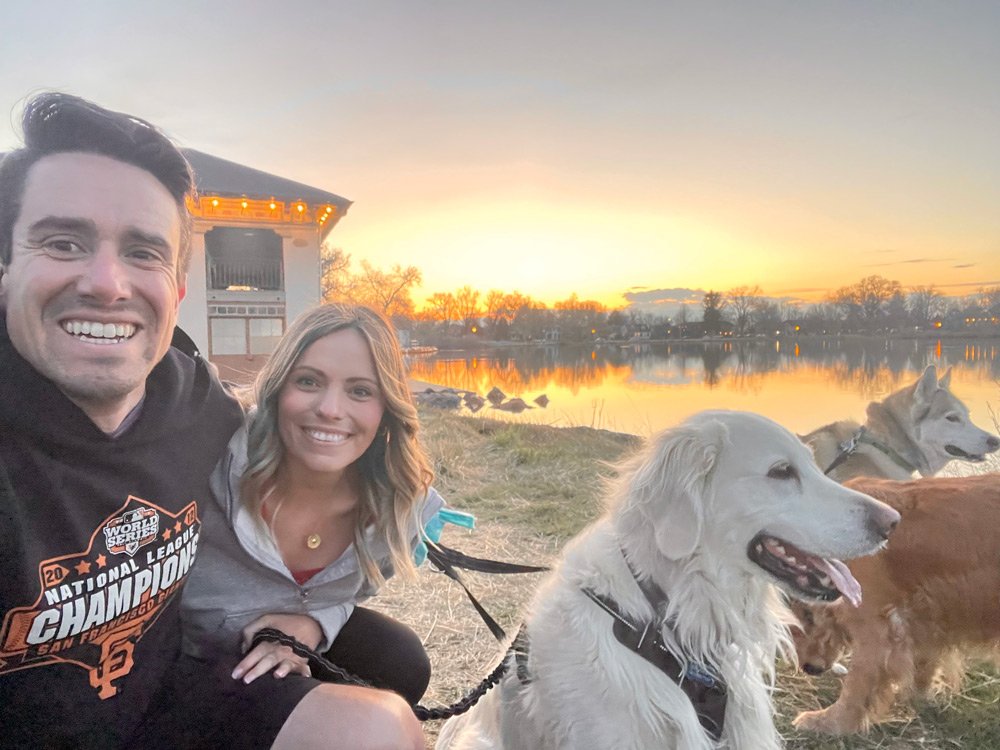 Gina Fidler and her husband sit watching the sunset in the park with their three dogs | Wash Park Health | Simple, Convenient, Personalized Healthcare in Wash Park, Denver