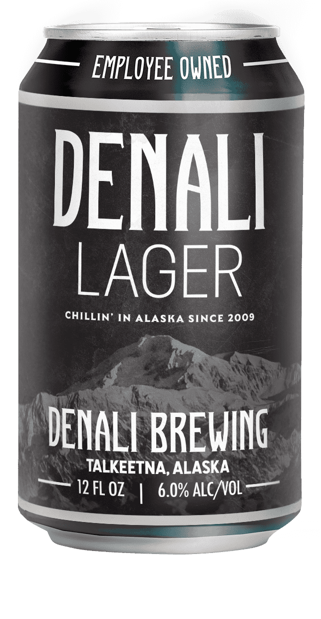 A can of Denali Lager beer by Denali Brewing, featuring mountain scenery, with details about the brewery located in Talkeetna, Alaska, and the beer's alcohol content of 6%.