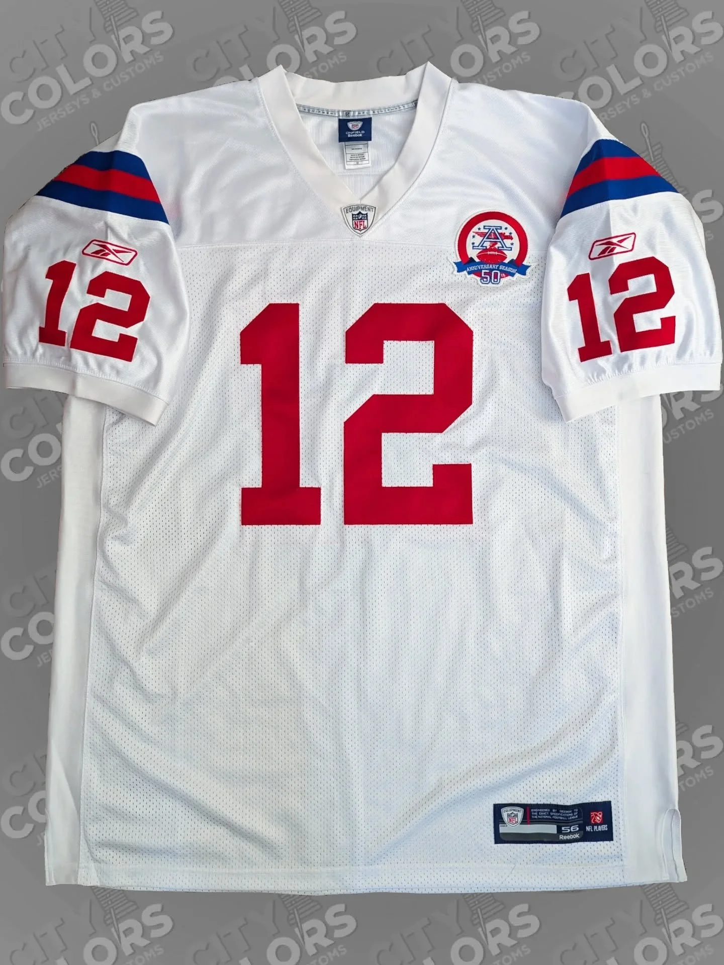 This Reebok on-field authentic Patriots jersey, with an AFL 50th anniversary patch from 2009, was sent in to be customized as a Tom Brady jersey with 1-layer numbering and a fabric-matching nameplate.

Best known as a part owner of the Las Vegas Raid