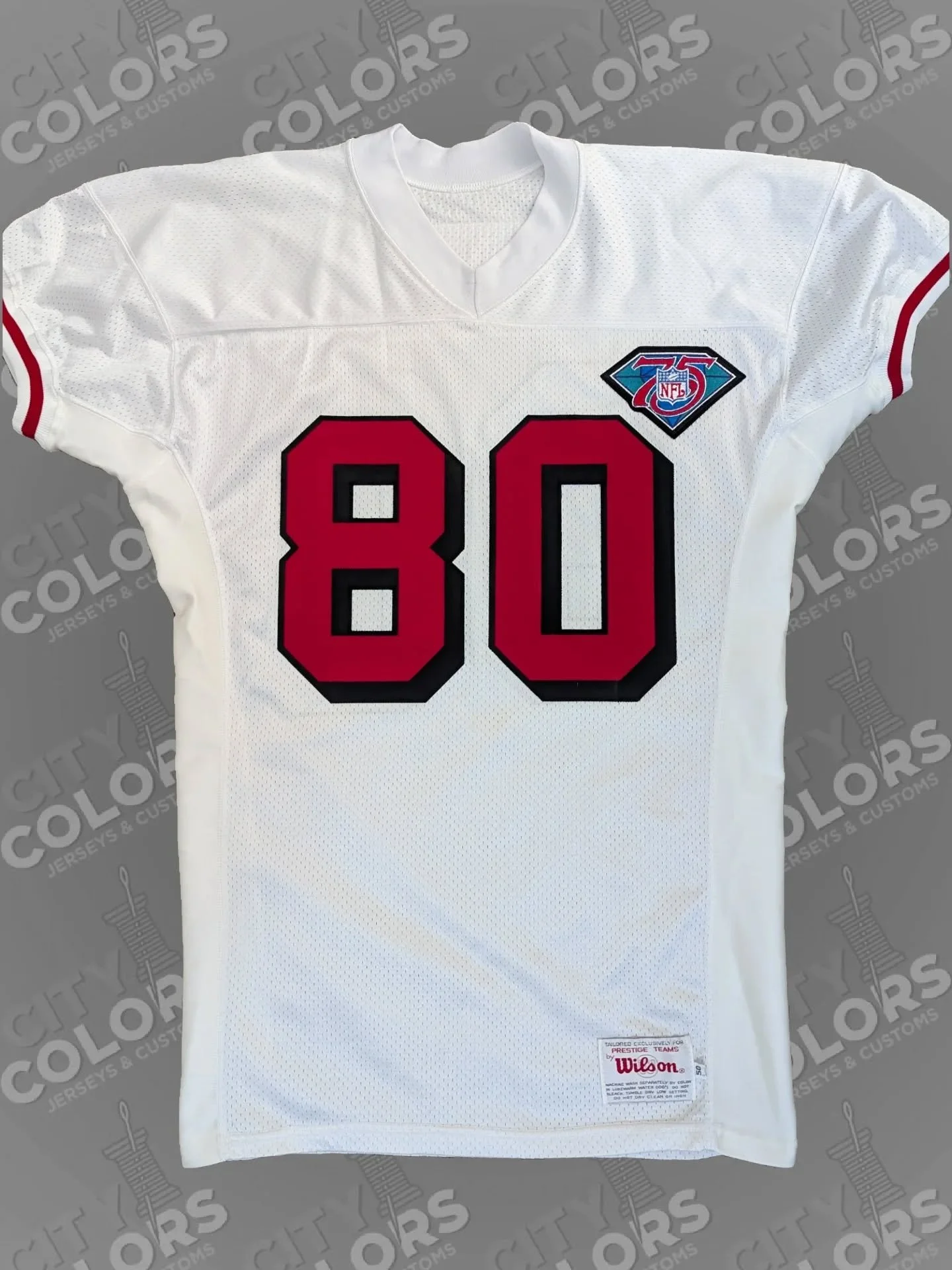 This vintage Wilson football jersey was sent in blank by a new customer who asked me to replicate a 1994 Jerry Rice 49ers jersey. I added two-layer numbers with drop shadows and a jersey-matching nameplate. The NFL 75th anniversary patch was worn by 