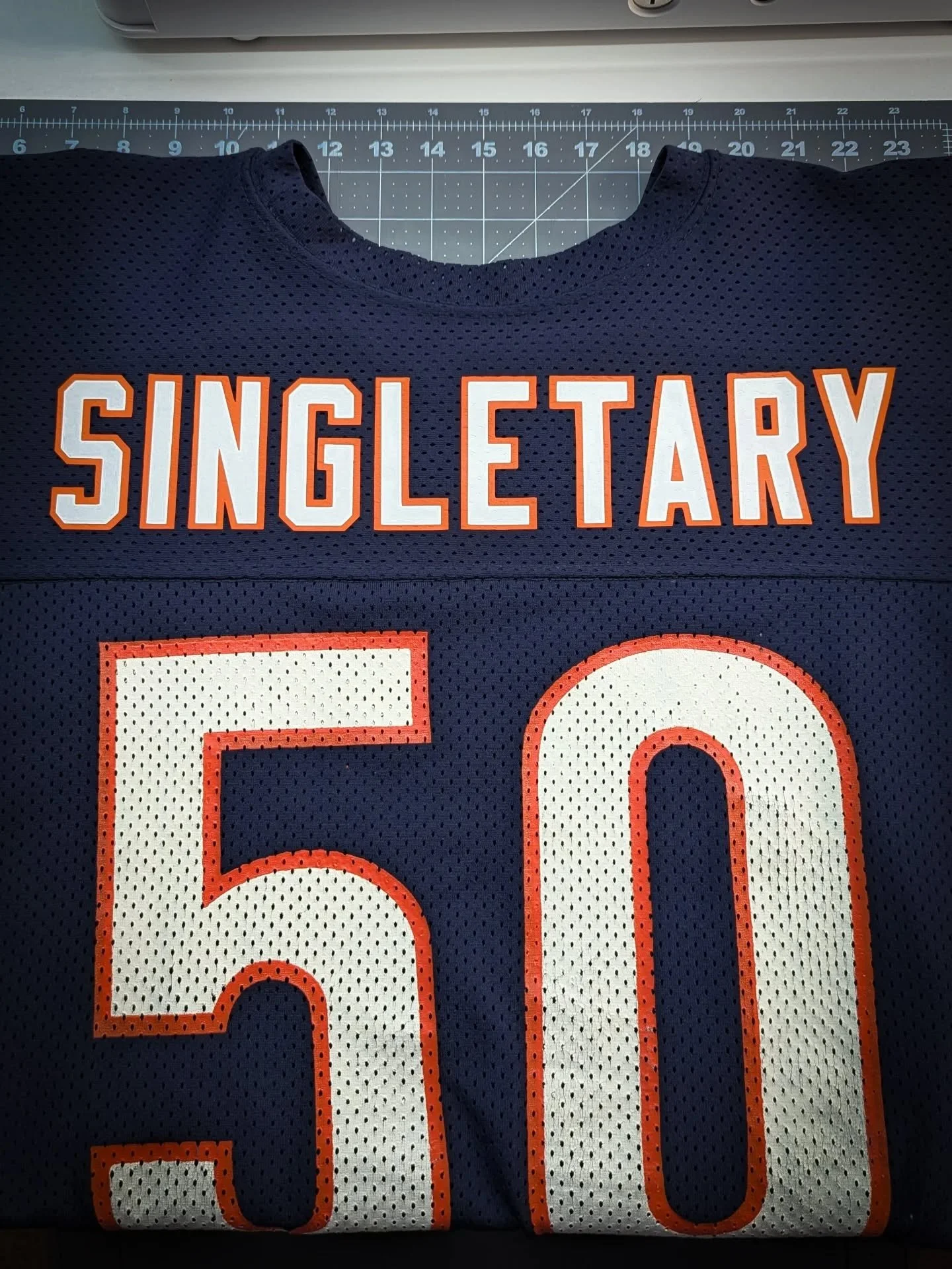 Fun with vinyl. ✂️ Added a name to this vintage Sand Knit brand Chicago Bears jersey from the 1980s. The name was directly applied to the jersey in two layers. It didn't look like there was previously a name on it. If there was, it was removed withou