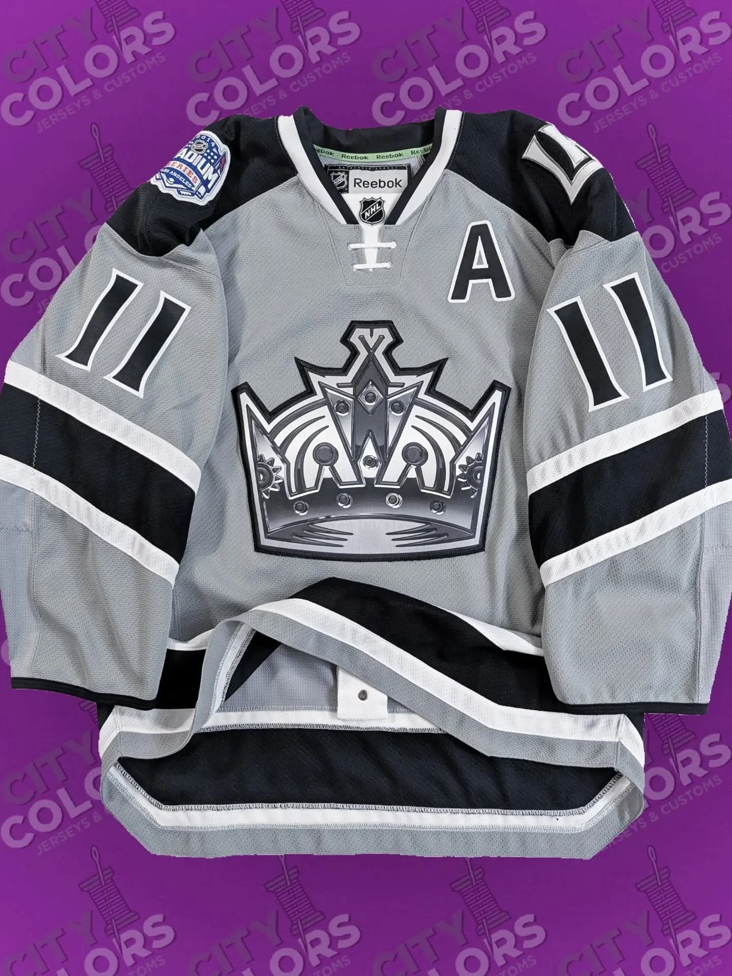 2014 Los Angeles Kings Stadium Series Reebok Authentic, sent in blank to be customized with the name and number of Kings lifer Anže Kopitar.

Designing this number kit took some minor adjusting since the Stadium Series numbers are oversized to 13 inc