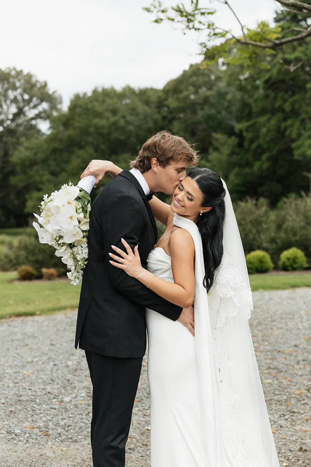 Outdoor wedding portraits at The Ivory Barn near Charlotte NC captured by a natural light wedding photographer.