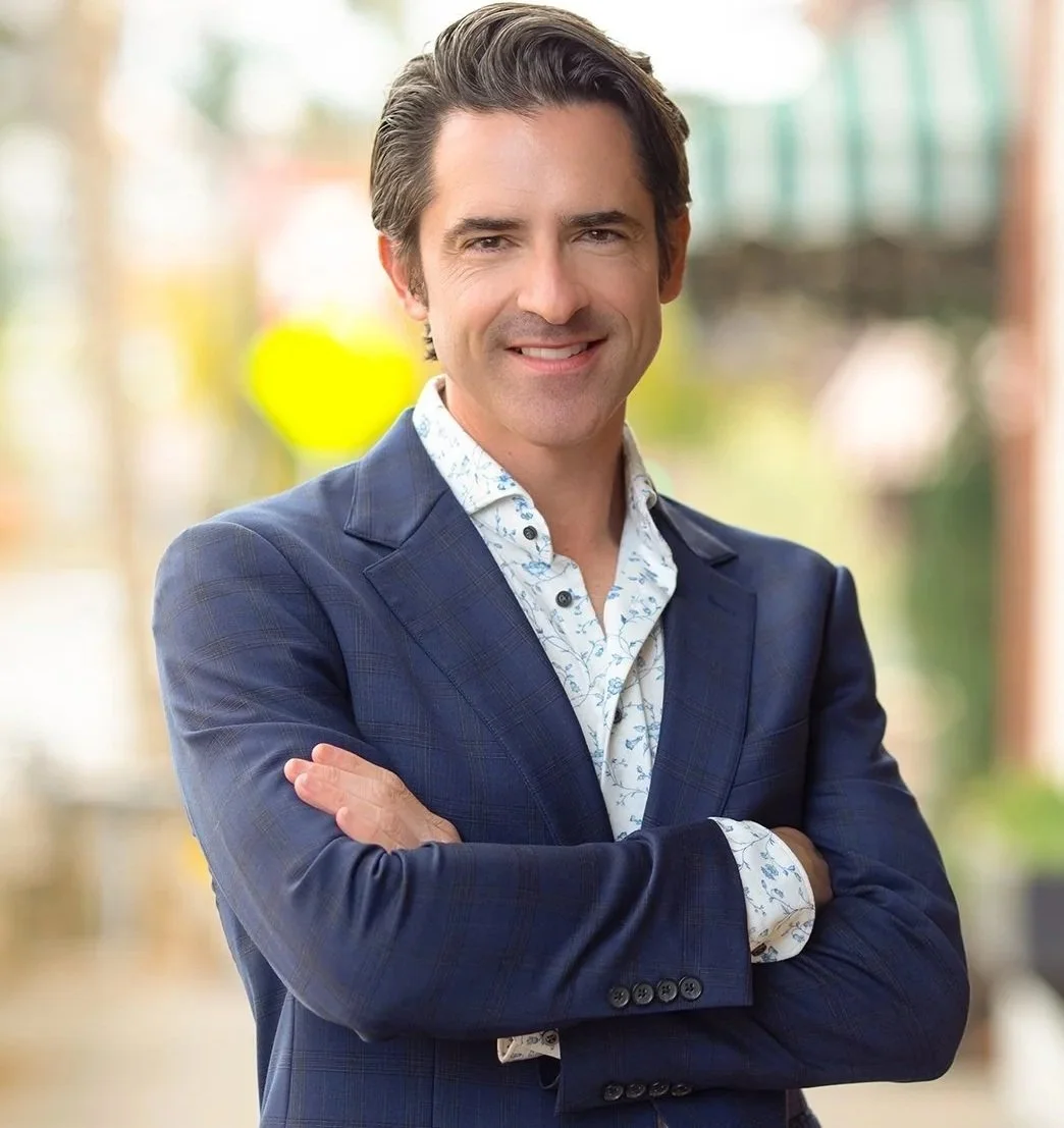 "Striking personal branding portrait of Michael, captured outdoors with natural light for a modern, approachable feel. His confident expression and professional presence make this image ideal for LinkedIn, business websites, and marketing materials. 