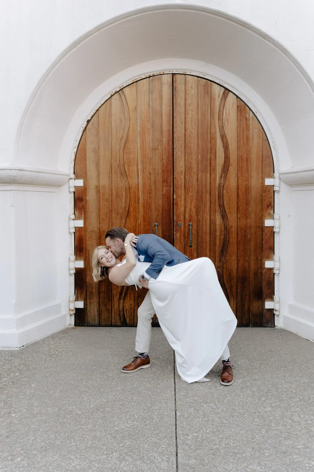 Bride and Groom Kiss at a Winery