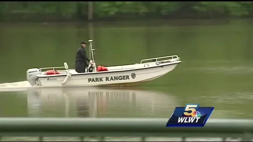 Park ranger on rescue boat