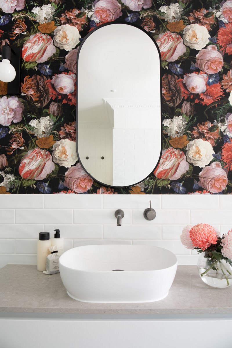 Front view of striking wallpaper used as this vanity backdrop of a Morningside interior design project by Marilena Baynes