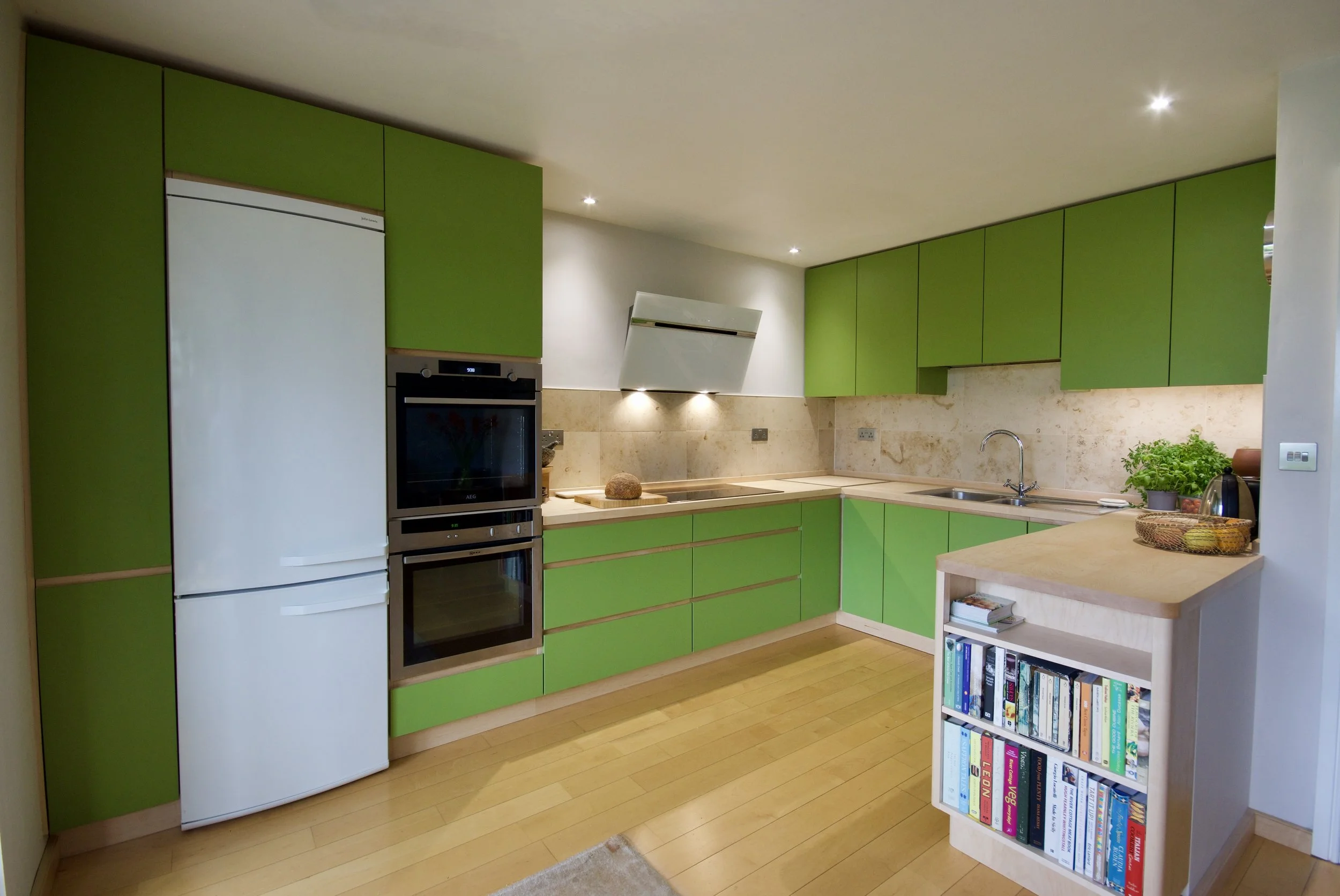 Green slab door kitchen