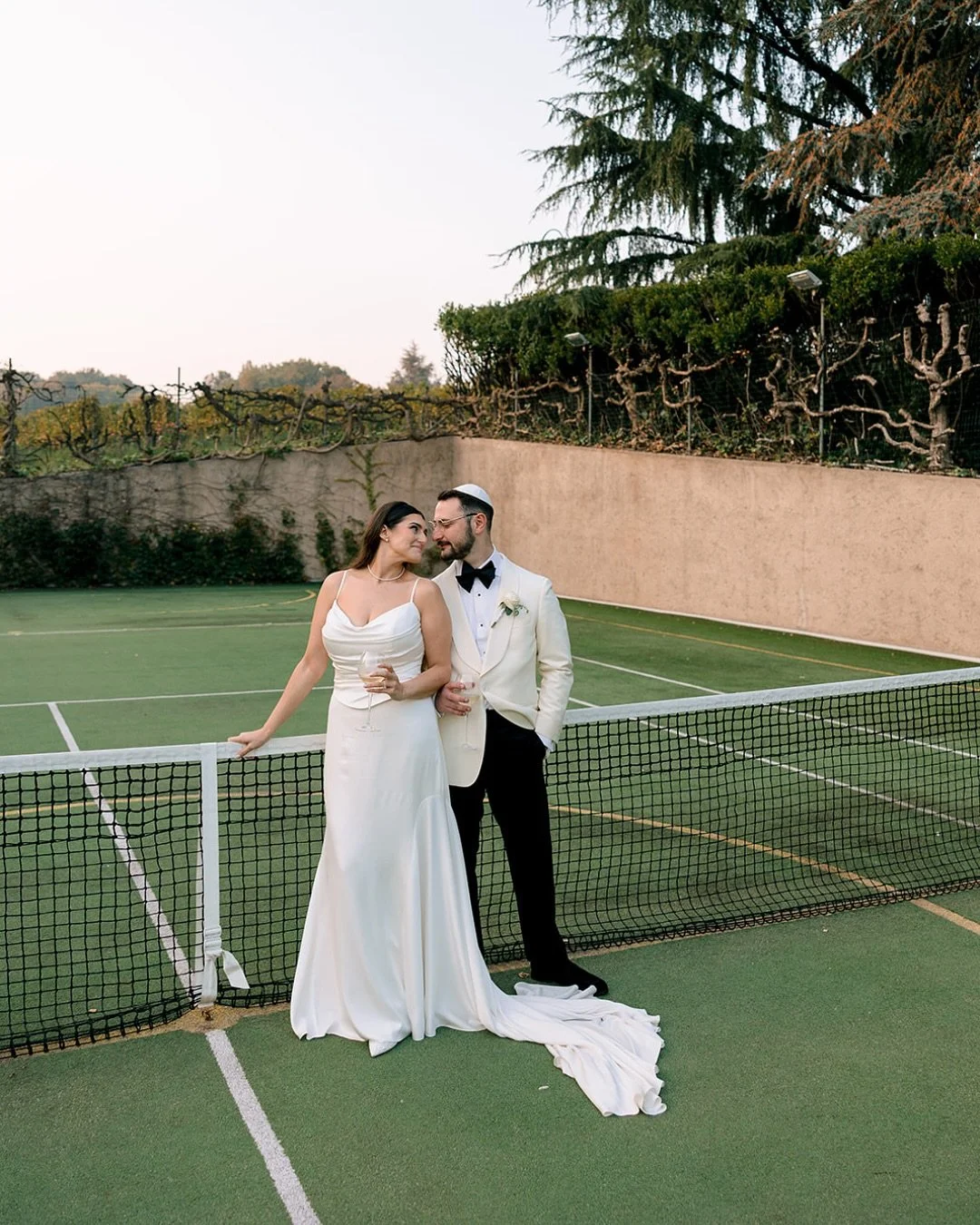Molly and Charlie got married surrounded by everyone they love, in a place that felt like a dream, @albereta 

They asked their guests to wear black, and the result was effortlessly elegant &mdash; a sea of familiar faces dressed in contrast against 