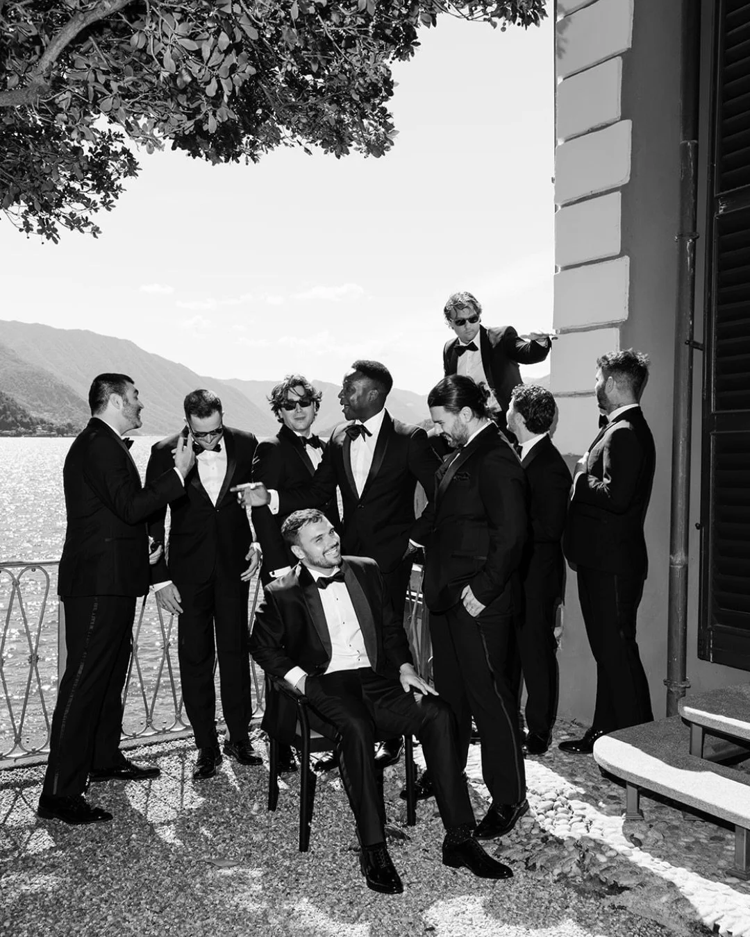 Lake Como wedding at Villa Cipressi, Varenna: @alexis_louisos &amp; Lucas.

A black-tie destination wedding on Lake Como, designed and planned by @ariannapozzoli.weddings white florals, a boat ride across the lake from Varenna and dinner under crysta