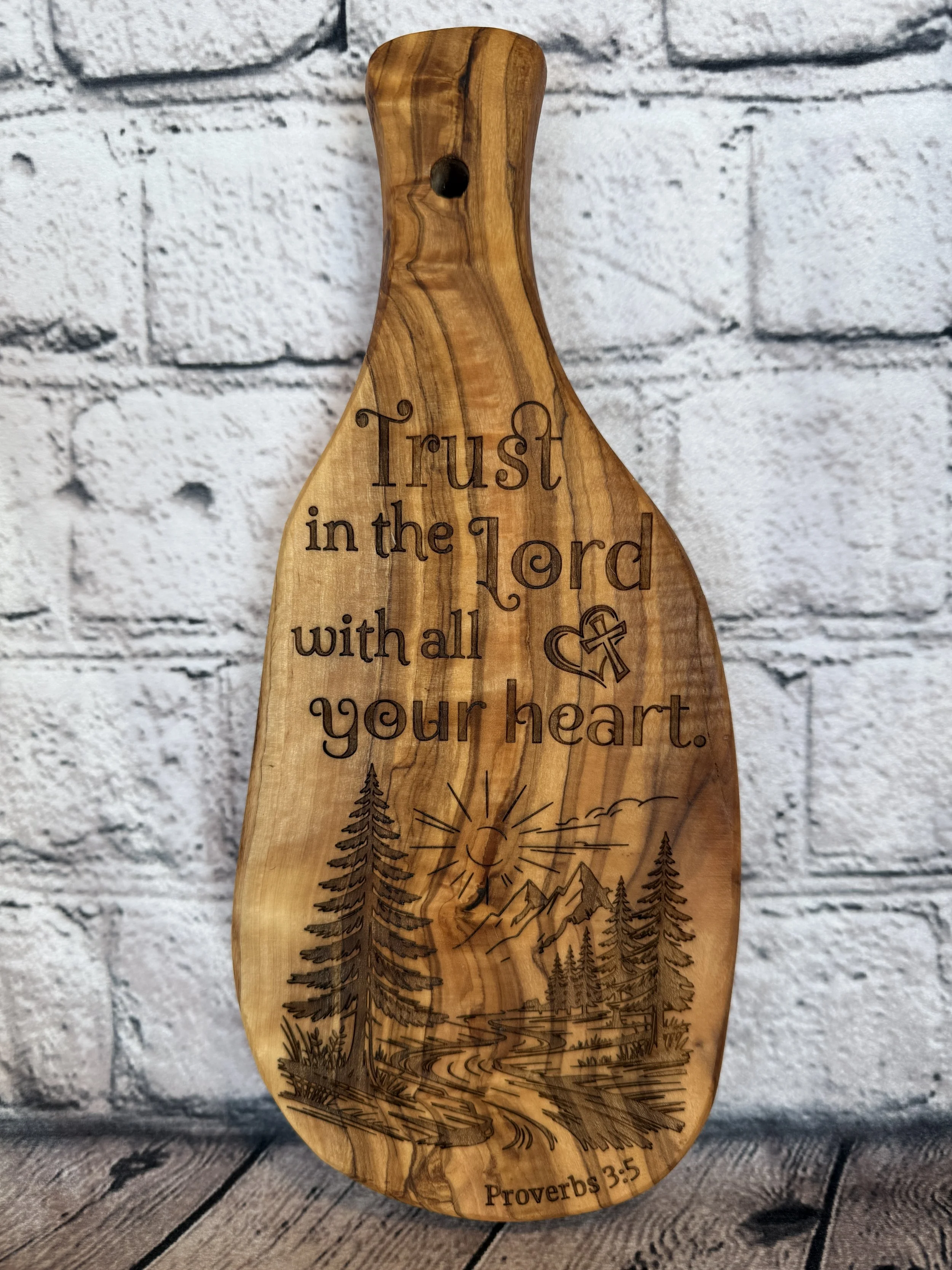 Small Olivewood with Trust in the Lord with all your heart engraved on it.