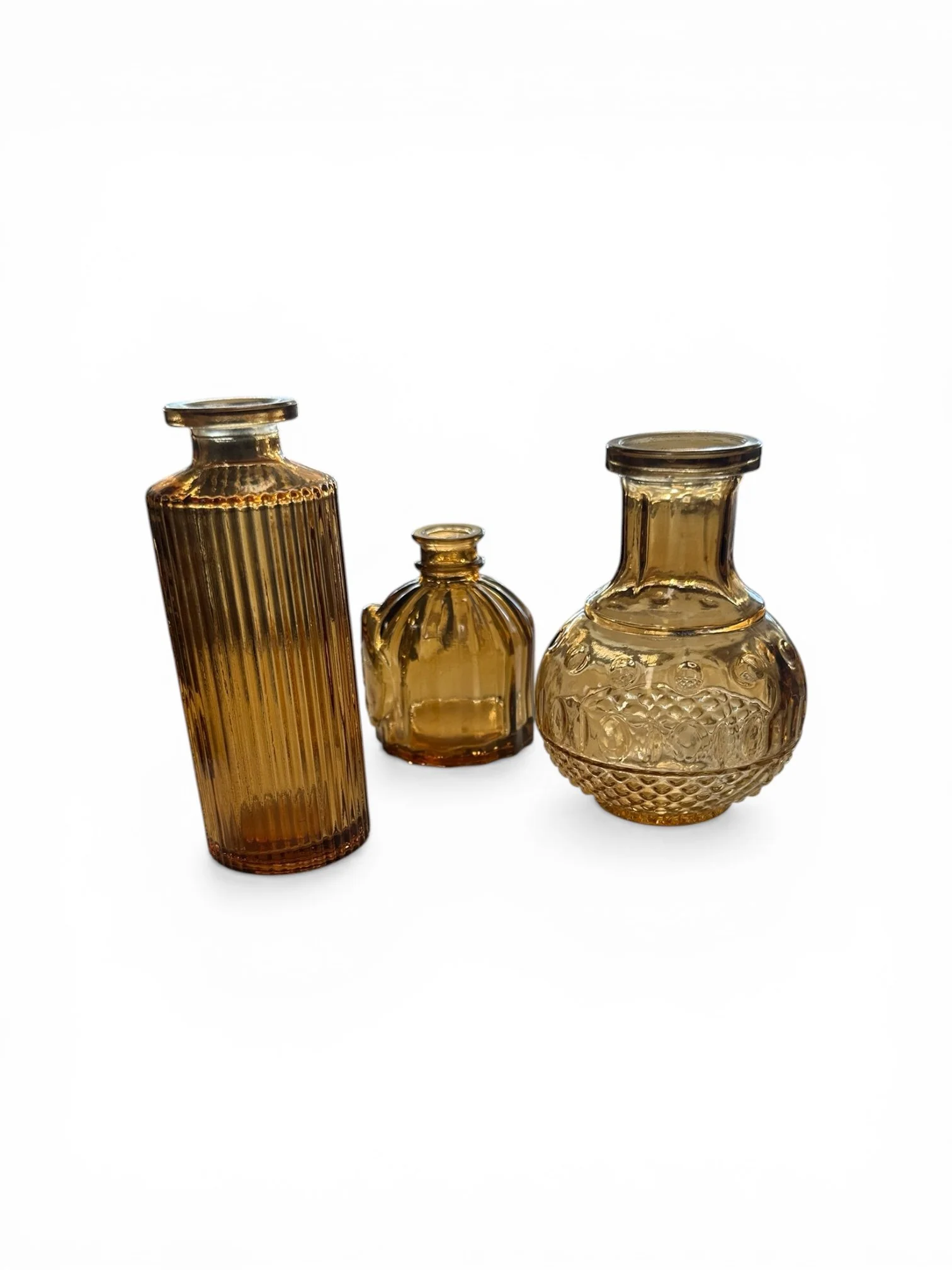 AMBER BUD VASES, varied heights
$1.25 each