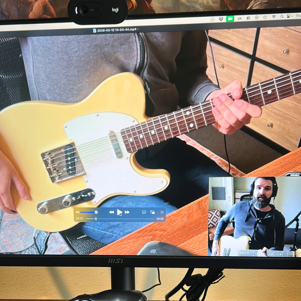 A photo of a computer screen showing an Asynchronous Video Lesson with Zac Watson.