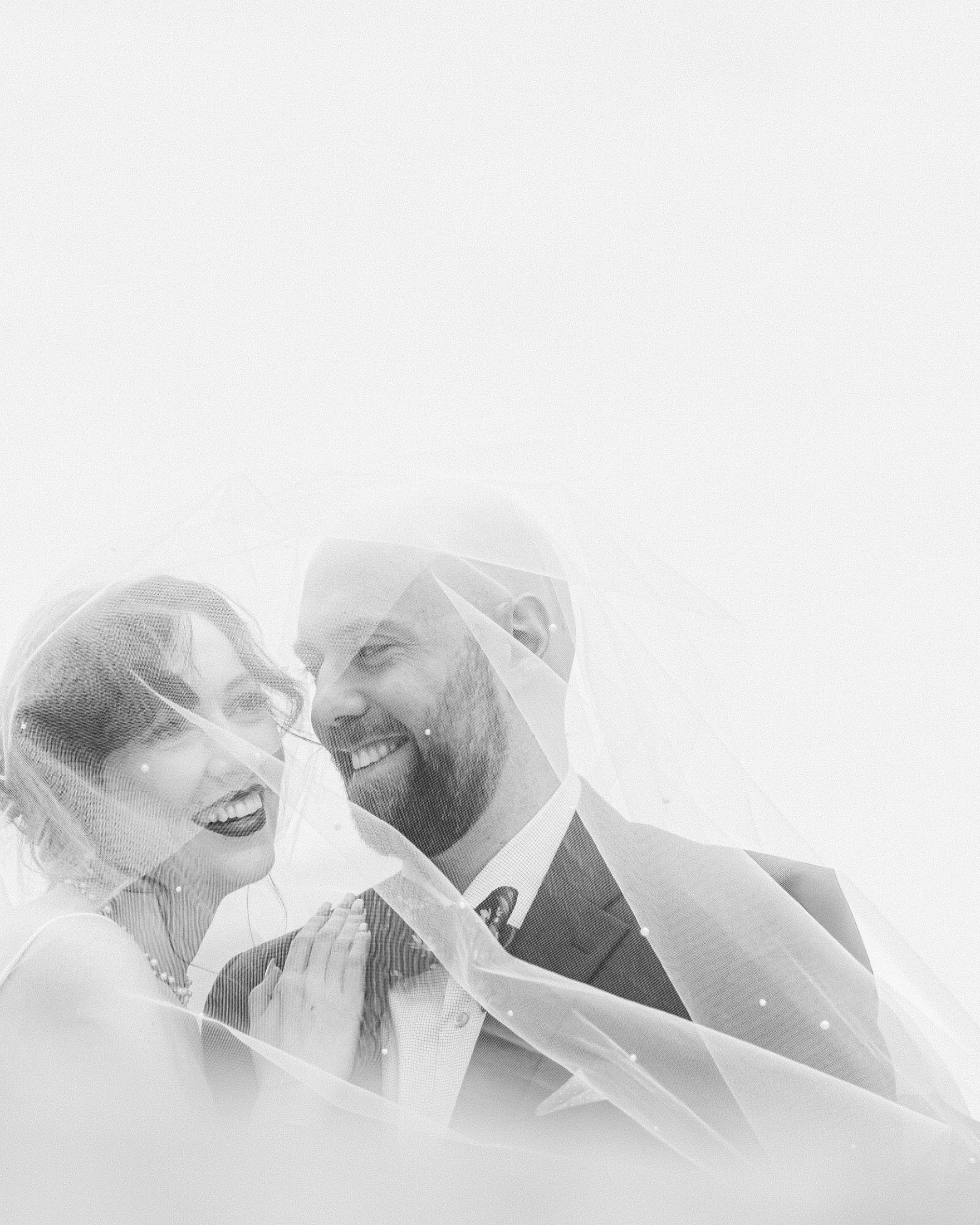 Some weddings are loud.
This one felt soft, intentional, and full of those little moments you almost miss if you aren&rsquo;t paying attention.

The way they looked at each other walking through the gardens. The laughter under the veil. The calm in t