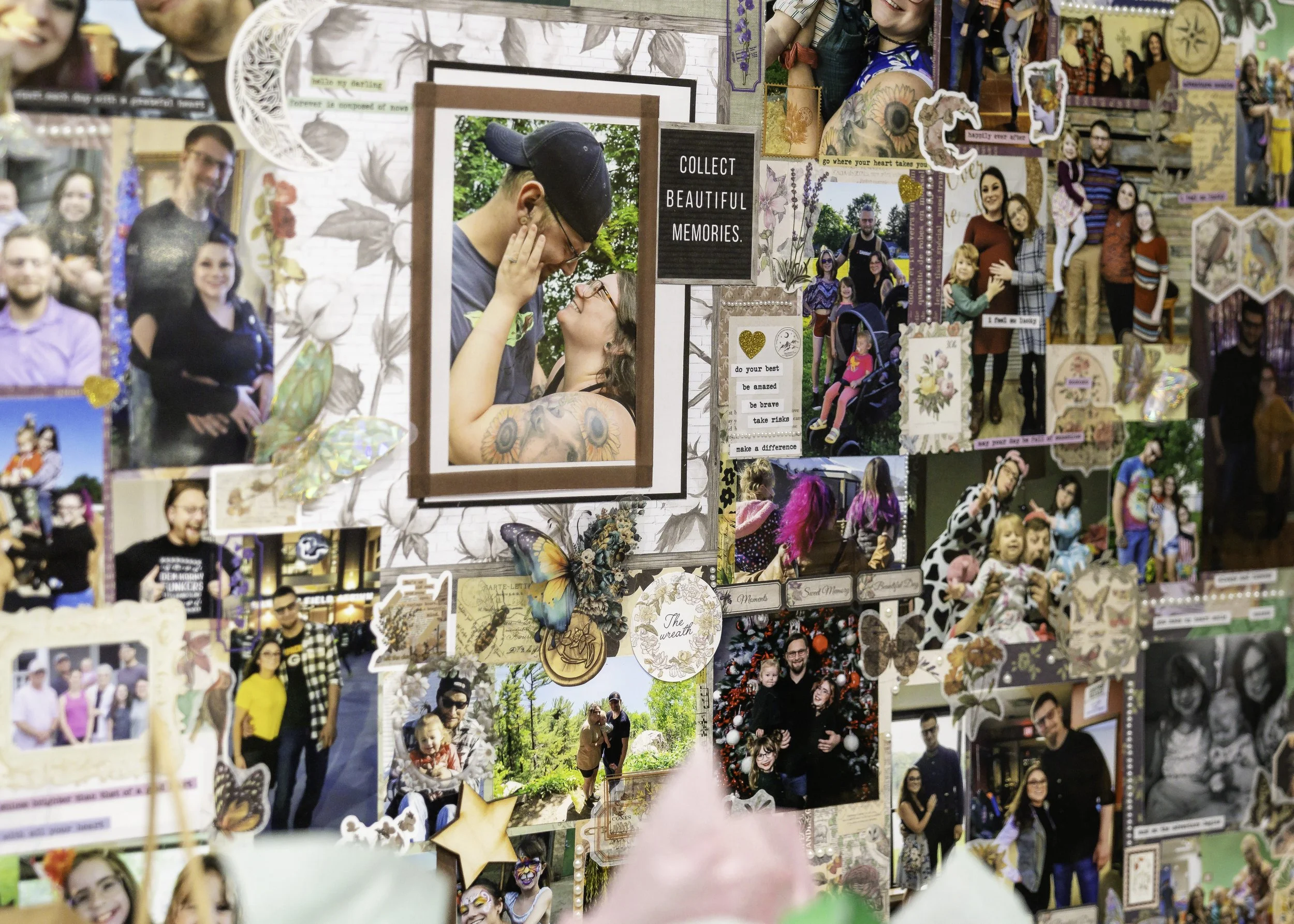 A collage of various photographs including family pictures, group photos, and candid moments, decorated with stickers, cutouts, butterflies, and motivational quotes.
