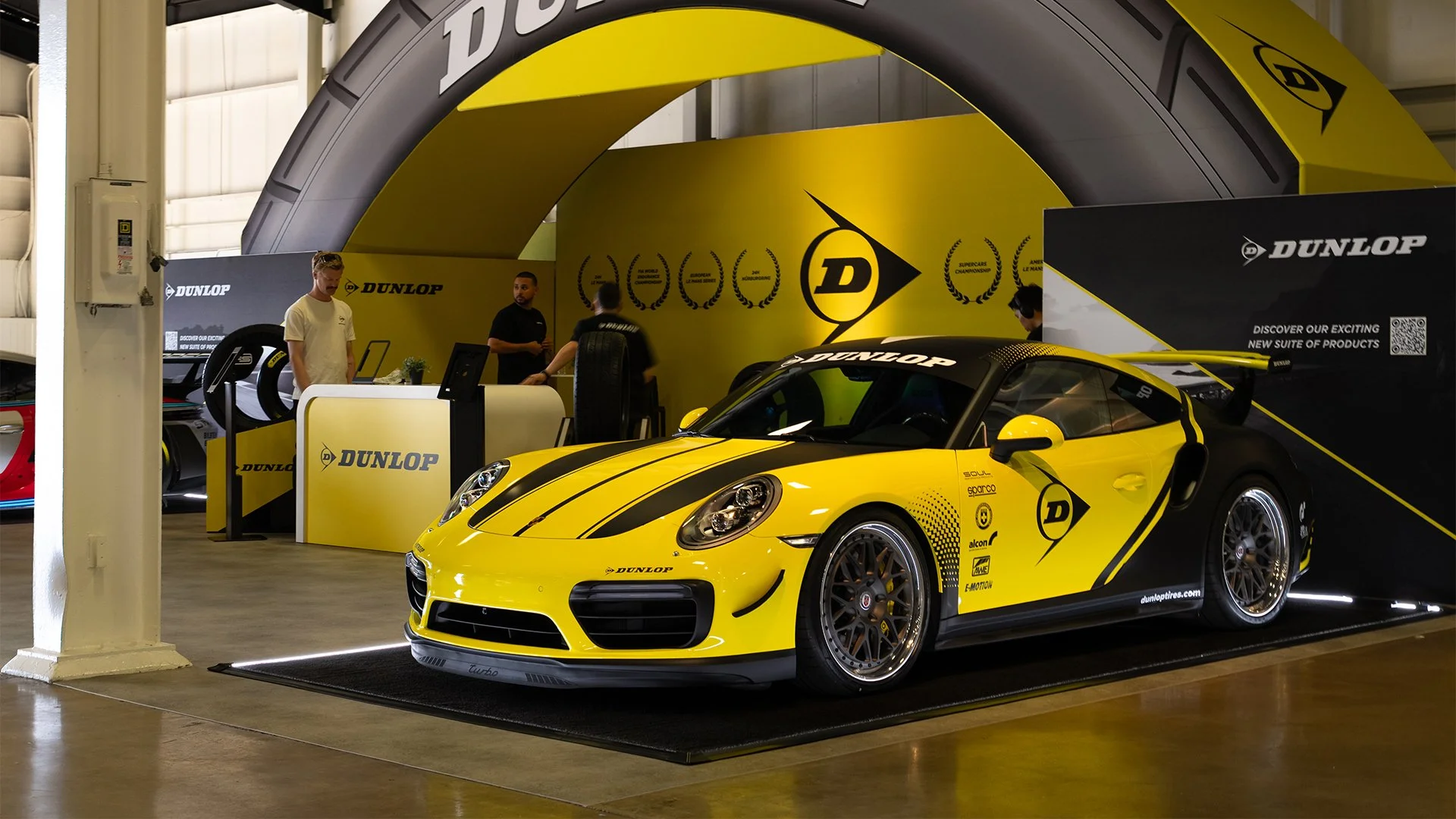 A Porsche 911 Turbo with Dunlop Tires branding
