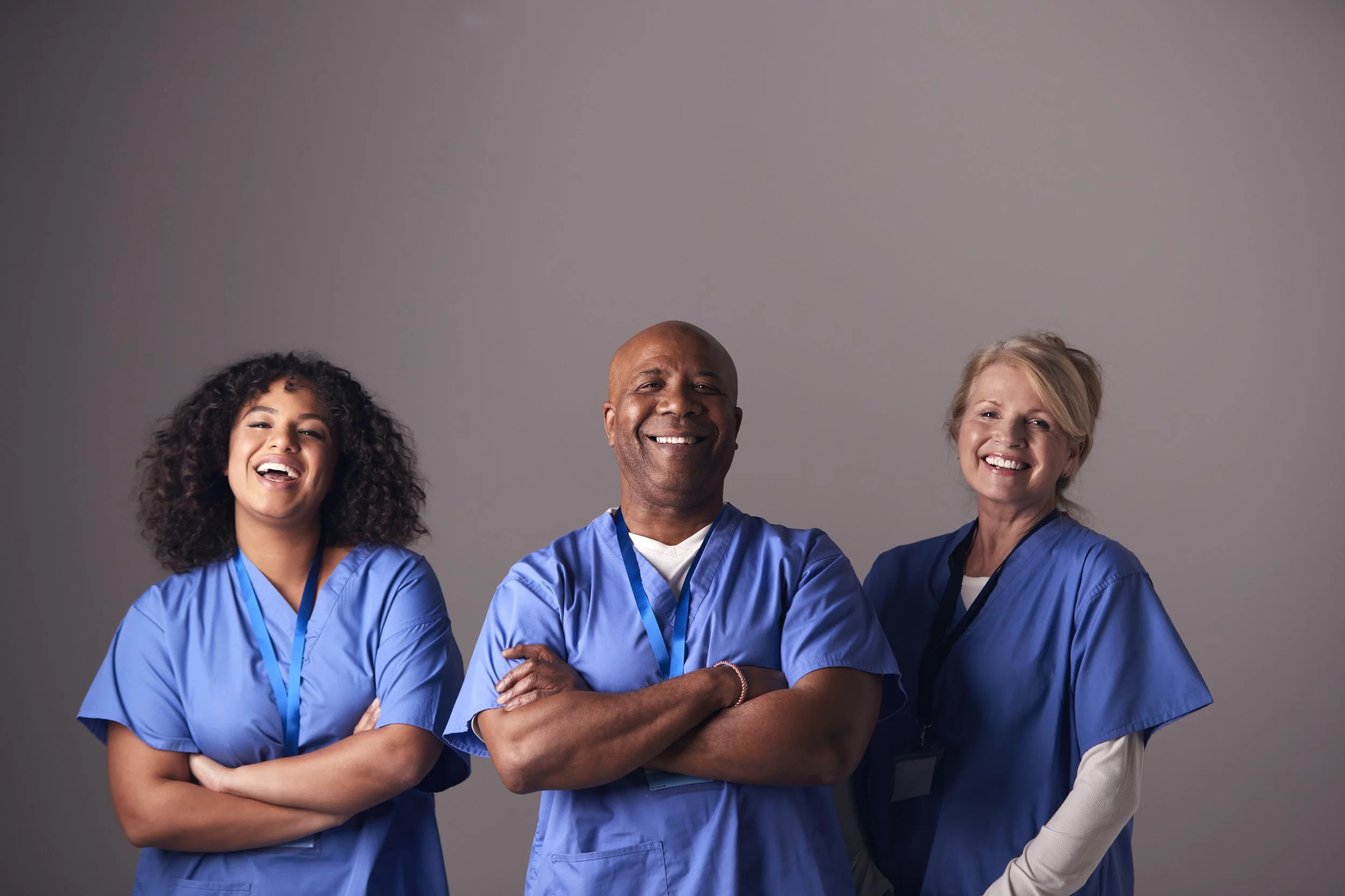 studio-portrait-of-three-members-of-surgical-team-2023-11-27-05-22-16-utc.jpg
