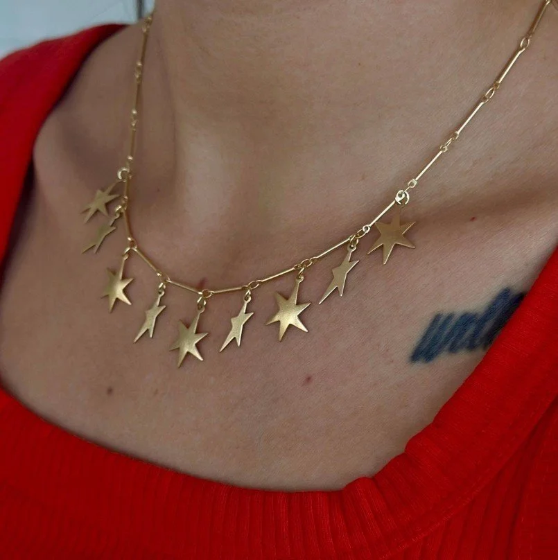 Vintage Celestial Star Brass Charm 1.jpg