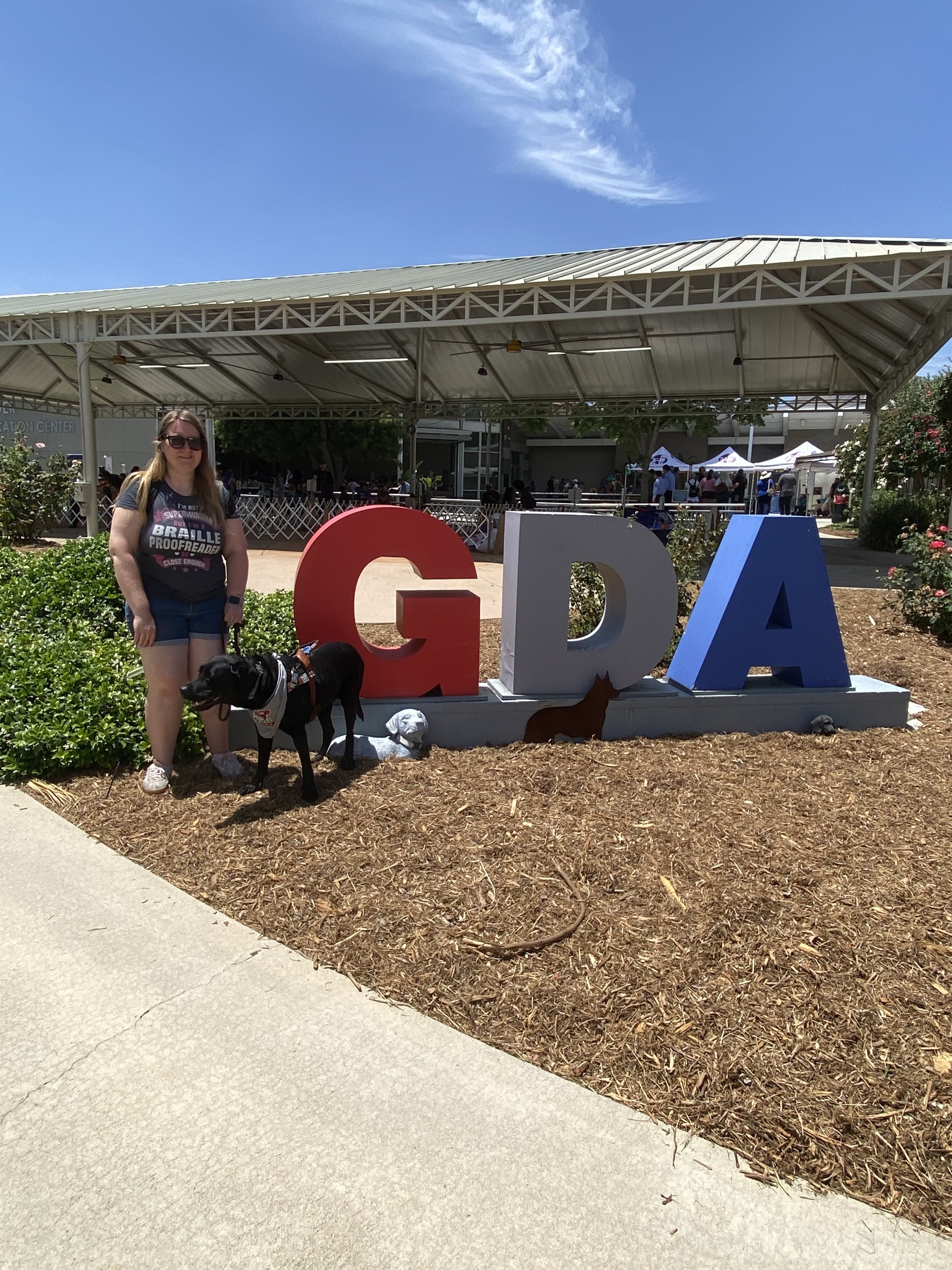 Lindsay and Eve in front of the GDA sign.