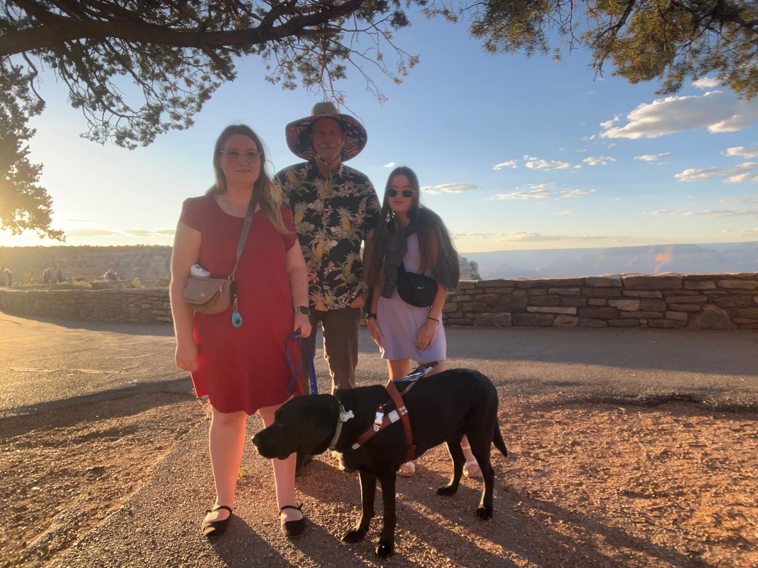 Lindsay, Leslie, Eve and their Dad in the Grand Canyon at sunset.