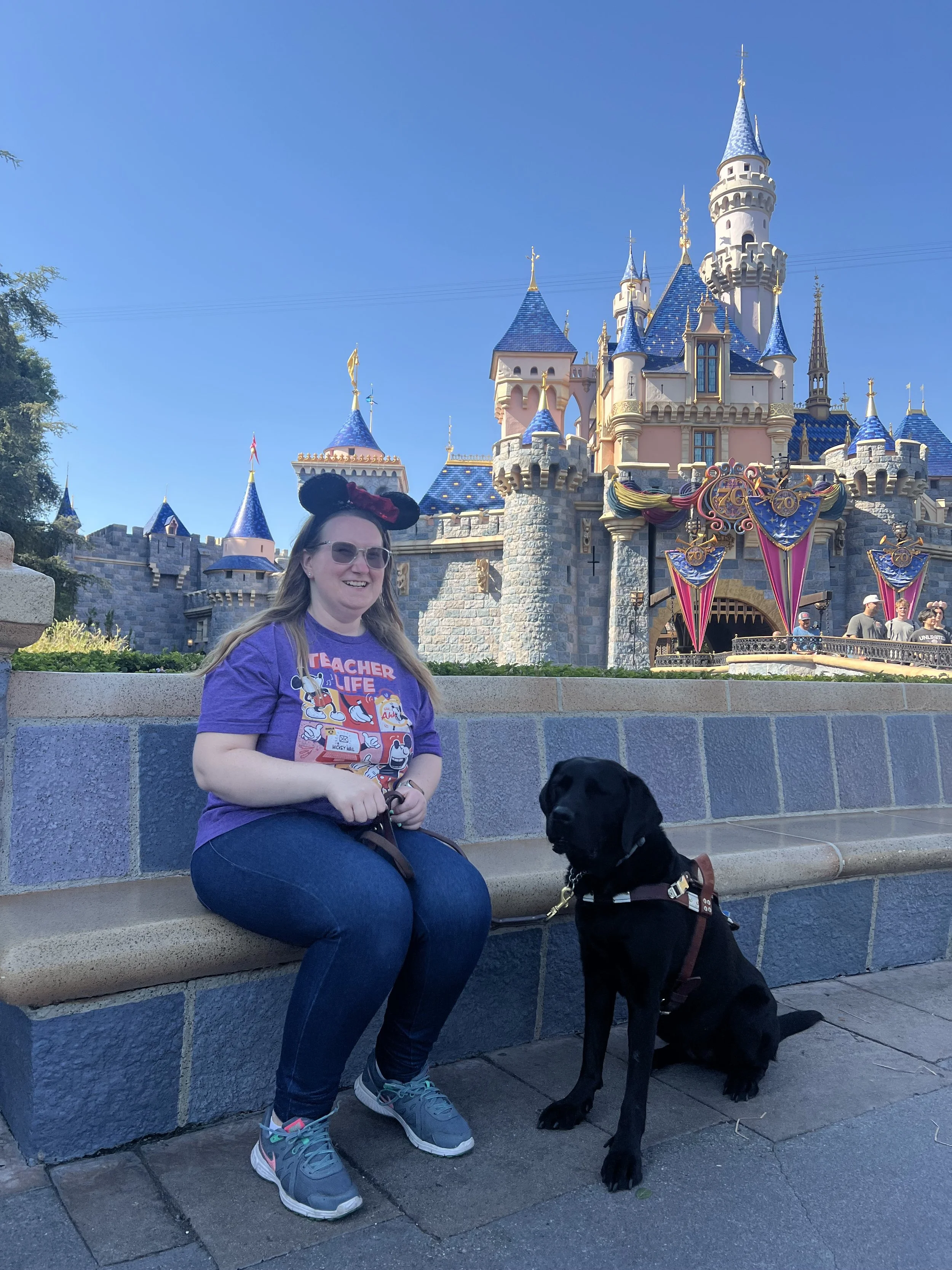 Lindsay and Eve in front of Cinderella’s Castle in Disneyland.