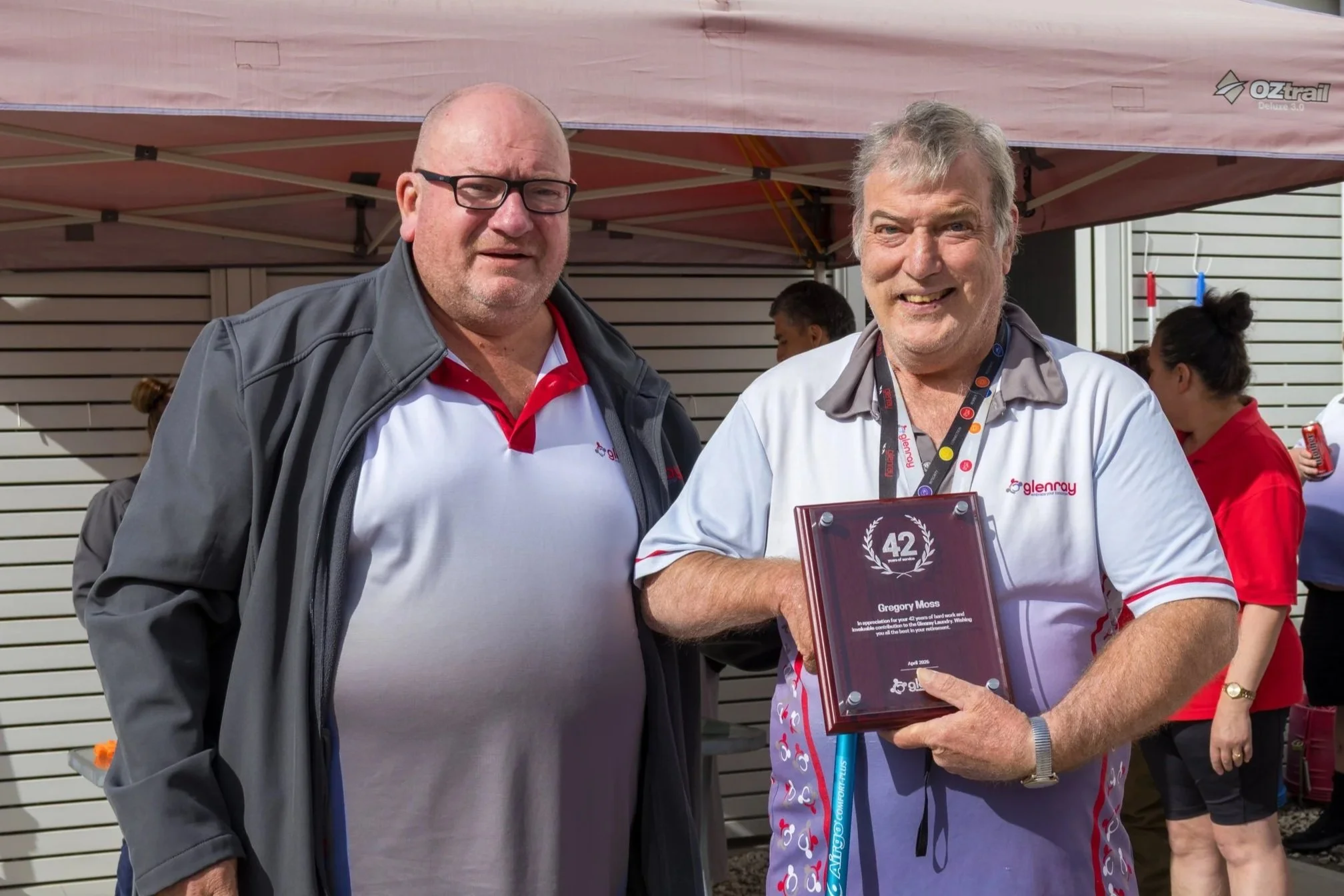 Greg receives his retirement plaque from Glenray CEO Scott Green, April 29 2026