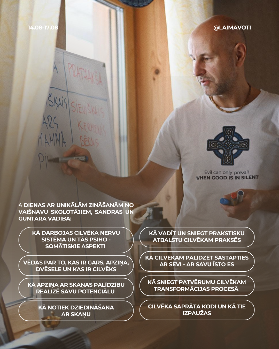 A man writing on a whiteboard with words in Latvian, standing in a room with wooden walls and a window. The man is bald, wearing a white T-shirt with a Celtic cross and text that reads 'Evil can only prevail WHEN GOOD IS IN SILENT.'