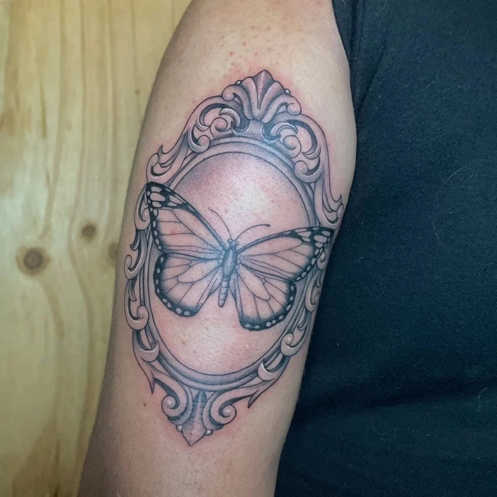 Butterfly in an ornamental frame I did recently! ✨ thank you so much! 

Please excuse the lighting in this photo we finished up very late! 

#adelaidetattoos#neotraditonaltattoos #flash #armtattoo #armtattoos #lineworkers  #blackworktattoo #blackwork