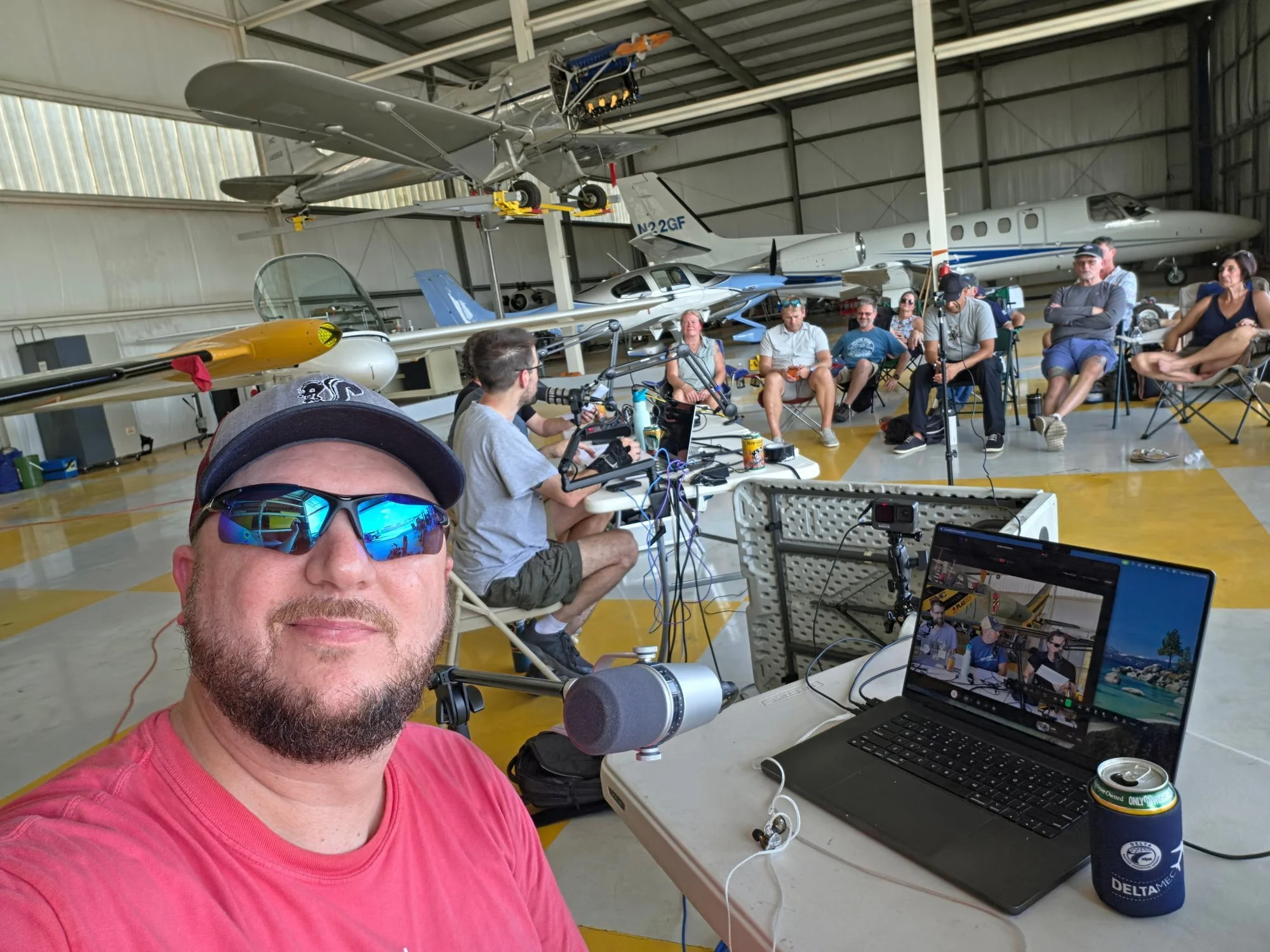 The live crowd in the hangar at McCollum Field, seen from the production table