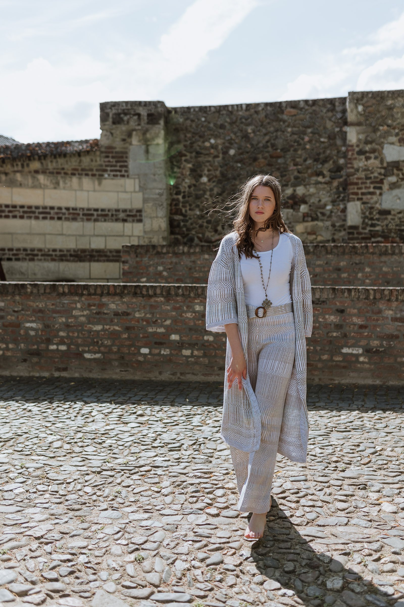 Graphic jacquard knitted kimono in linen blend of white, neutrals and a hint of blue