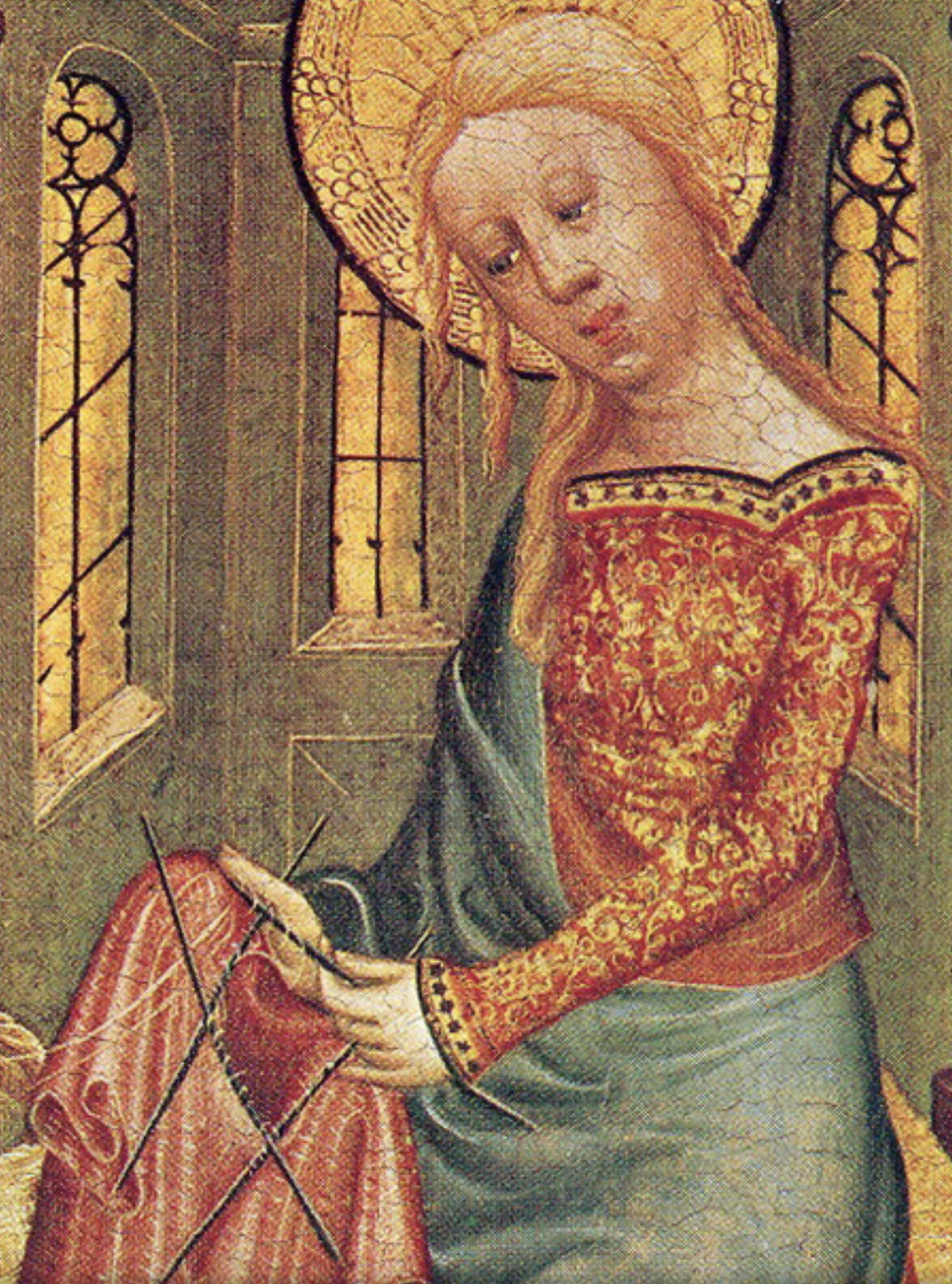 Detail of the Knitting Madonna from the Buxtehude Altar (German, 1400–1410), showing an early depiction of hand knitting in richly patterned Renaissance garments — historical inspiration for the timeless craft of knitwear.