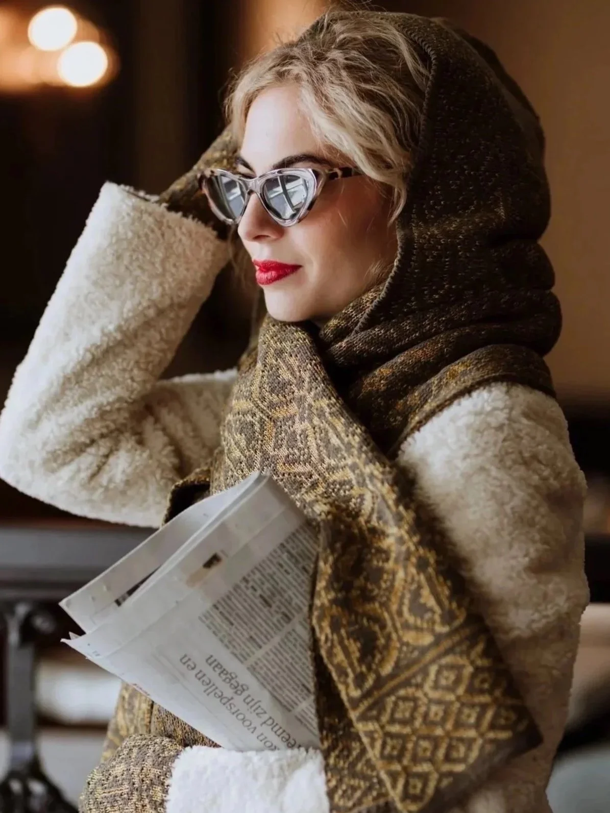 Woman wearing Studio Myr Velvet collection scarf in merino and velvet, styled with soft drape and sculptural texture