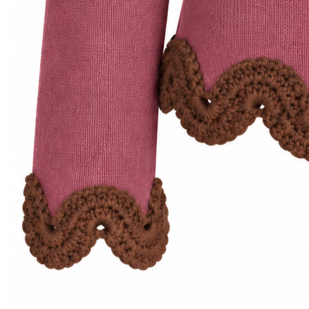Close-up of the Eleonora jumper showing fine dusty rose merino knit and hazel brown hand-crocheted baby alpaca lace at the cuff.