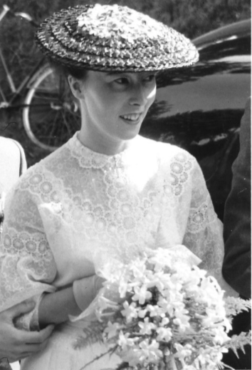 Young bride wearing a self-designed lace wedding dress and hat, reflecting a personal legacy of craftsmanship and refined femininity that later influenced Studio Myr