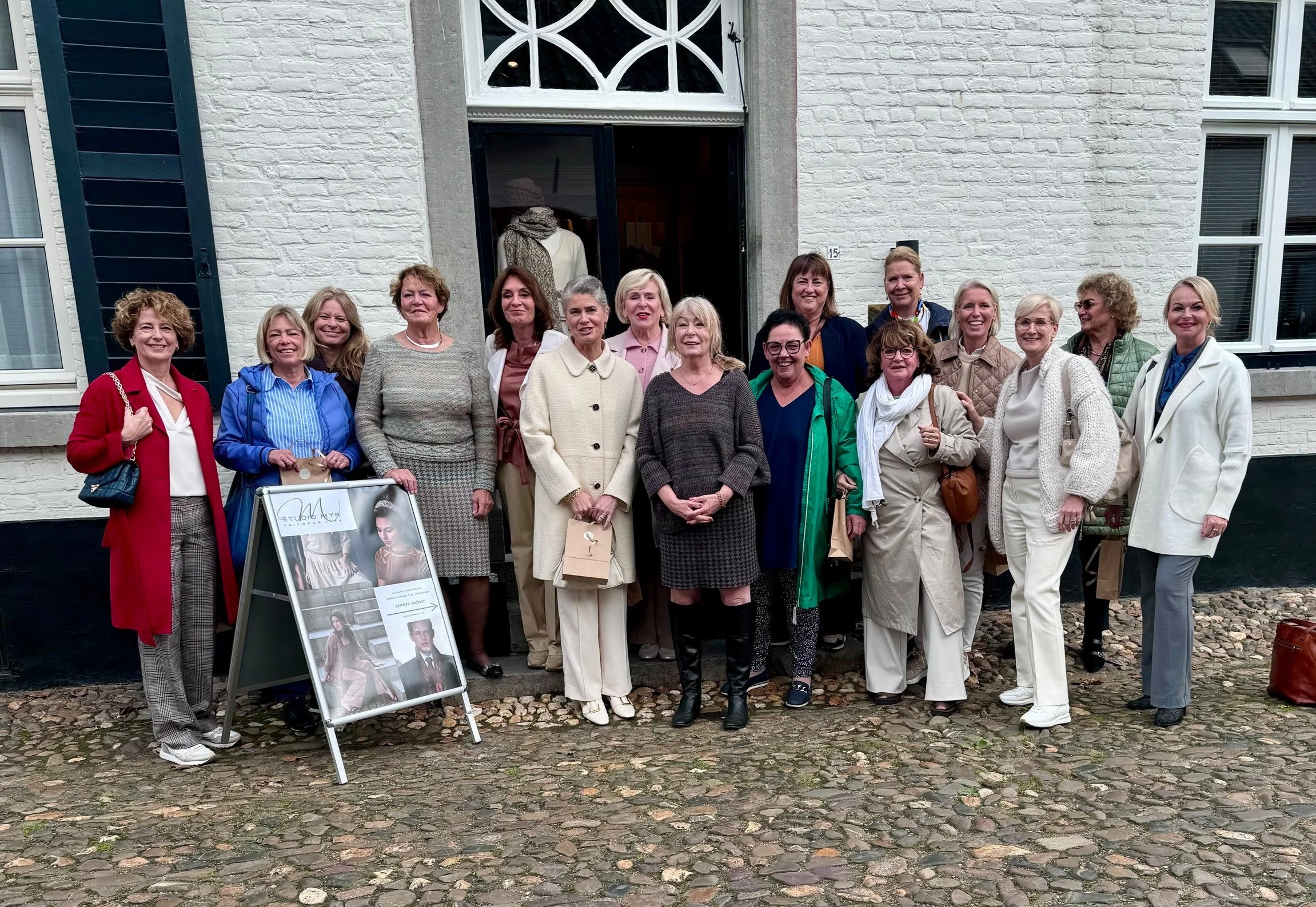Group of female mayors of Limburg visiting the Studio Myr boutique and atelier in Thorn.