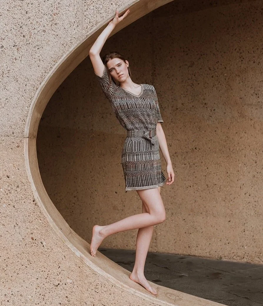 Graphic jacquard knitted short sleeve dress with matching belt in linen blend of black and neutrals total view