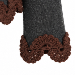 Studio Myr BAROQUE – Close-up of the Francisca jacket sleeve with intricate chocolate brown hand-crocheted Baby Alpaca lace edging