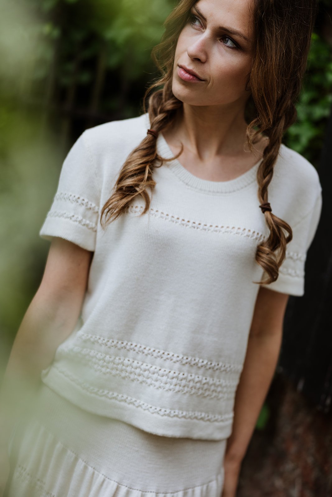 Soft lace-knit detailing on Studio Myr Merino Lace Knit Tee in Pearl wool white
