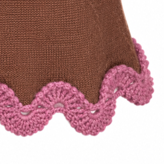 Detail of the Eleonora Skirt in Hazel Brown, showing the scalloped Dusty Rose Baby Alpaca crochet lace along the hem.