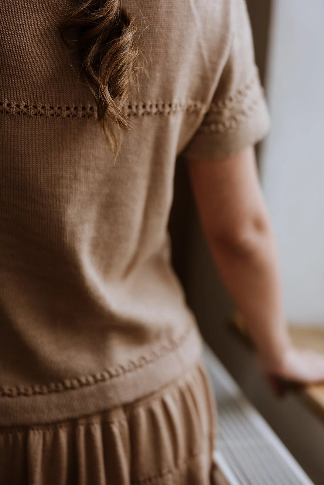 Back detail of Studio Myr Merino Lace Knit Tee in Honey-coloured beige Merino wool