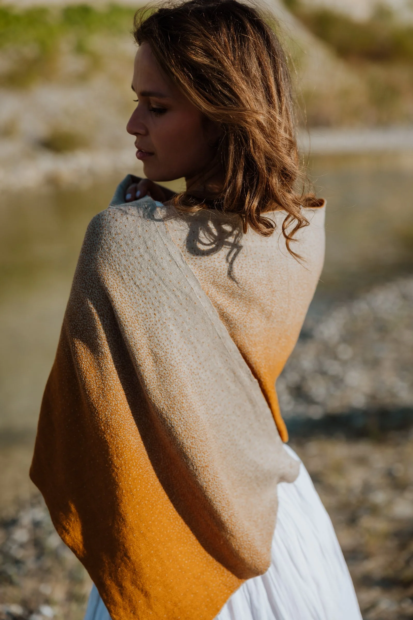 Bali cotton gradient scarf draped around the shoulders
