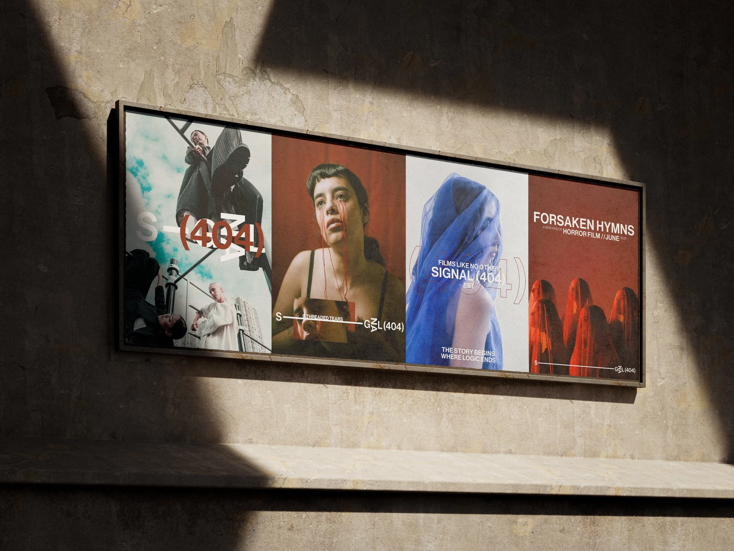 Mockup of posters for Signal 404. 4 posters designed for Signal 404 sit in one large frame next to each other on a concrete wall