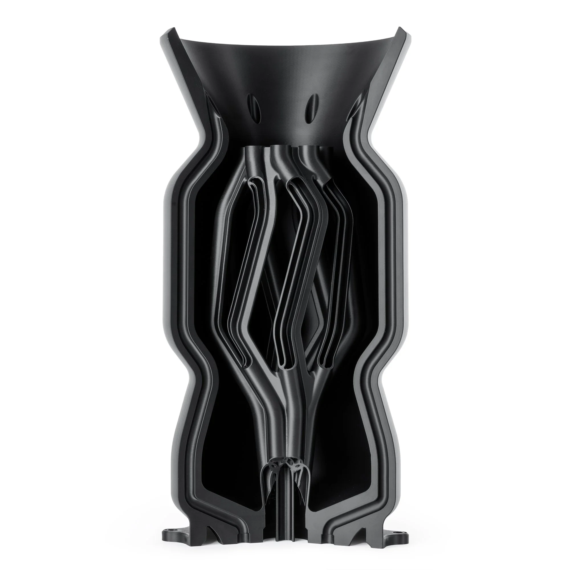 Genomskärningsvy av en cylindrisk 3D-printad komponent med integrerade interna kanaler som minskar monteringsbehovet och förbättrar komponentens prestanda.