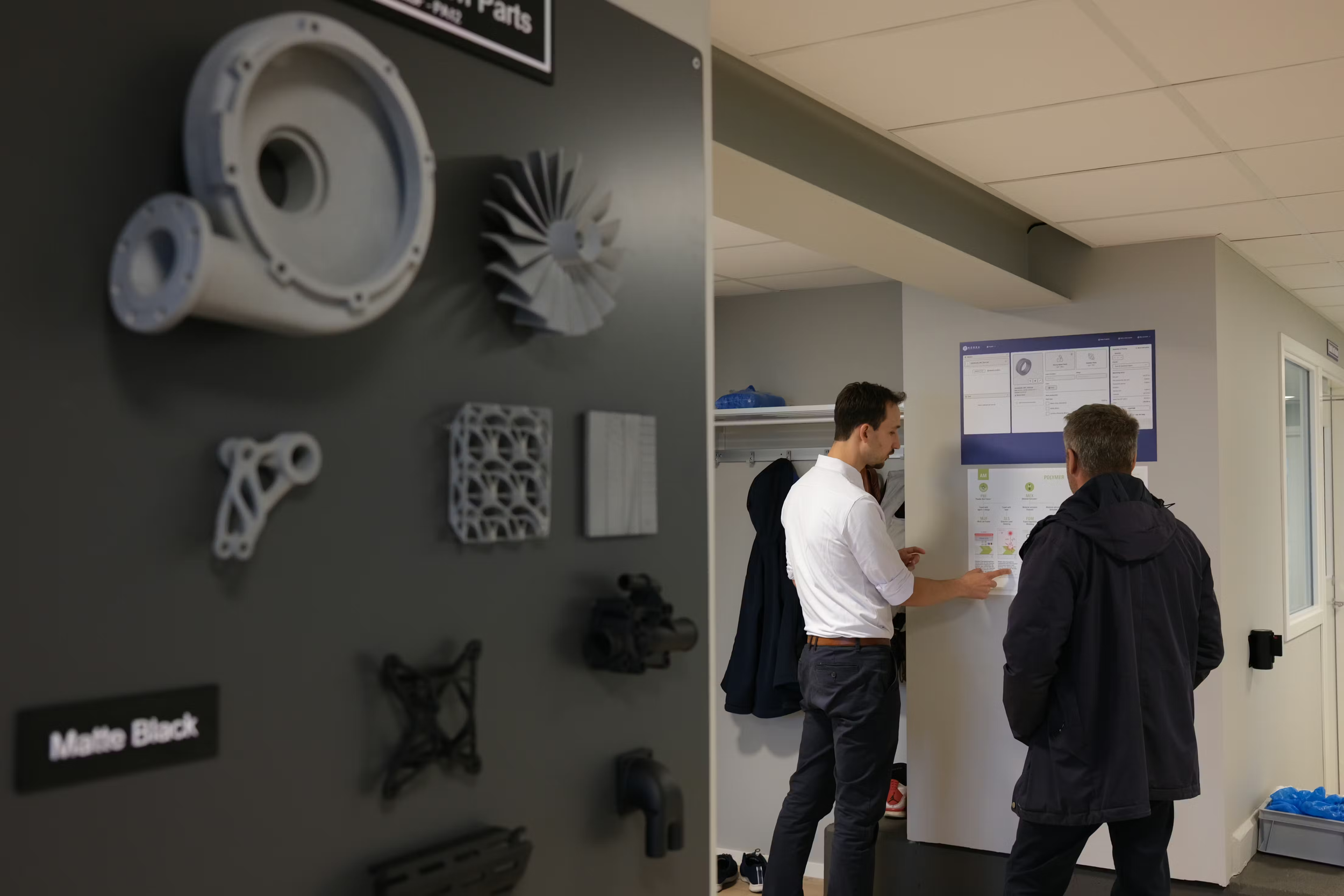 Visitors at Norra AM open house learning about the additive manufacturing production workflow