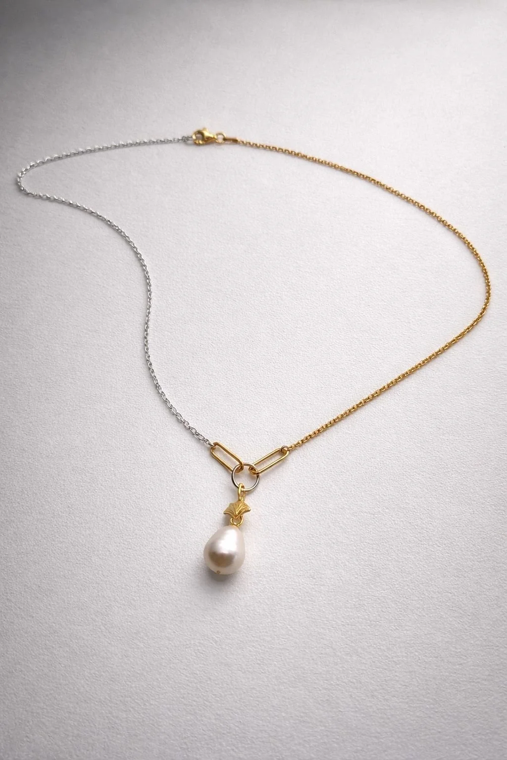 The ‘Retreat' pearl gold vermeil and sterling silver chain pendant