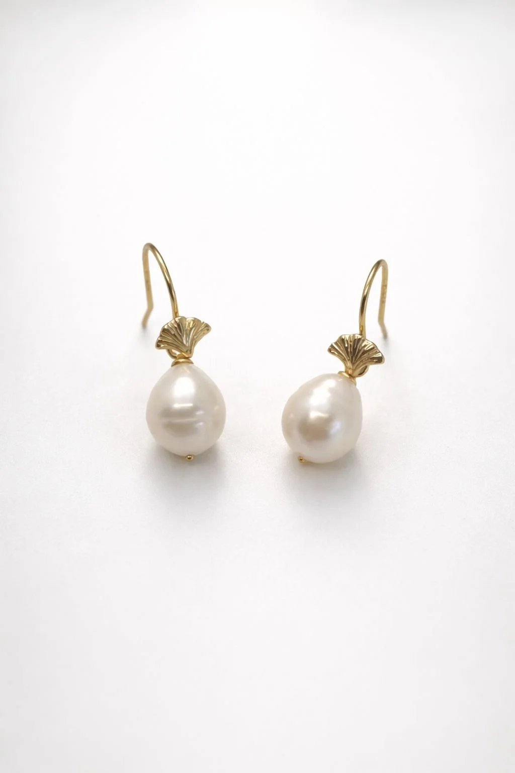The ‘Retreat’ freshwater pearl gold vermeil wire hoop earrings